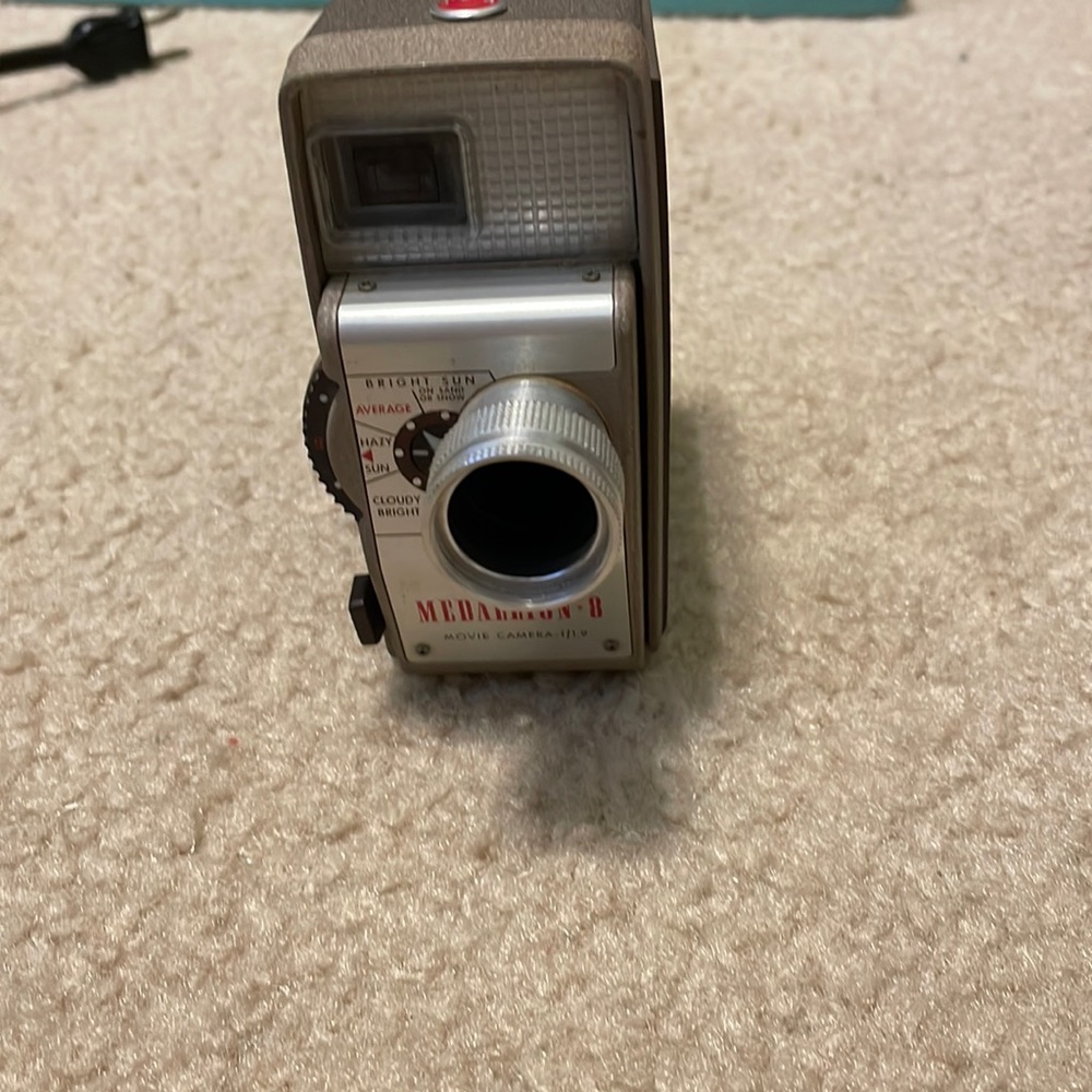 Vintage Kodak Medallion-8 movie camera and Harwood light bar